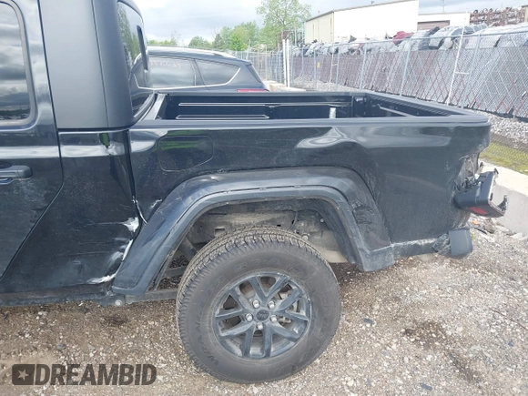 2022 Jeep Gladiator Texas Trail with VIN 1C6HJTAG7NL125006, listed as a IAAI auction lot 42288180 with 96,694 mi miles and . Bid and sale history available at DreamBid. Image 6.