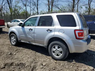 2010 Ford Escape XLS with VIN 1FMCU9C70AKC85380, listed as a Copart auction lot 52868005 with 302,211 mi miles and Clean title. Bid and sale history available at DreamBid. Image 2.
