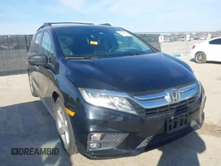 2018 Honda Odyssey EX-L z VIN 5FNRL6H74JB031306, wystawiony jako IAAI lot #41603478 z przebiegiem Nie podano mil oraz . Historia ofert i sprzedaży dostępna na DreamBid. Obrazek 1.