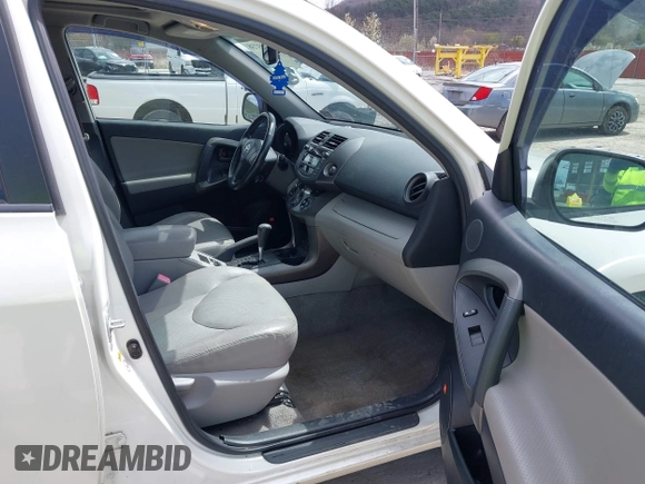 2010 Toyota RAV4 Limited with VIN JTMDF4DV3A5023063, listed as a IAAI auction lot 41983738 with 163,059 mi miles and . Bid and sale history available at DreamBid. Image 5.