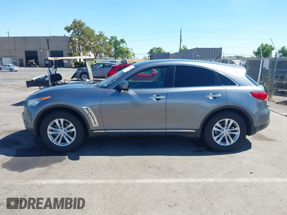 2017 Infiniti QX70 with VIN JN8CS1MWXHM415170, listed as a IAAI auction lot 42788300 with 128,468 mi miles and . Bid and sale history available at DreamBid. Image 14.