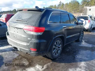2017 Jeep Grand Cherokee Overland with VIN 1C4RJFCG8HC835645, listed as a IAAI auction lot 41442765 with 95,324 mi miles and . Bid and sale history available at DreamBid. Image 4.