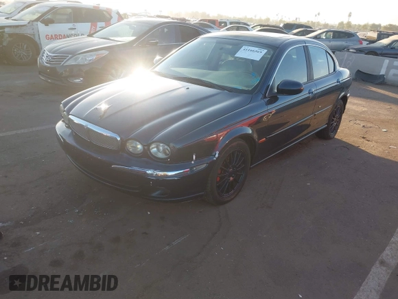 2007 Jaguar X-Type z VIN SAJWA51A57WJ26388, wystawiony jako IAAI lot #41166569 z przebiegiem 106 179 mil mil oraz . Historia ofert i sprzedaży dostępna na DreamBid. Obrazek 2.