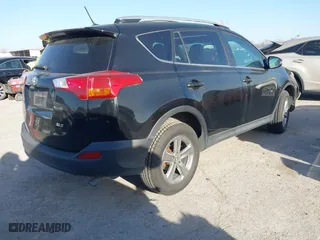 2015 Toyota RAV4 XLE with VIN 2T3WFREV7FW133974, listed as a IAAI auction lot 41818894 with 118,296 mi miles. Bid and sale history available at carsss.com. Image 4.