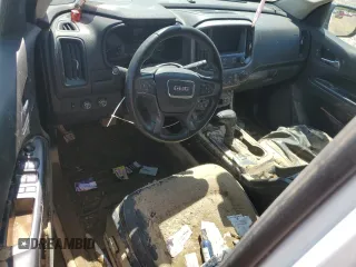 2021 GMC Canyon 4WD AT4 z VIN 1GTG6FEN5M1118081, wystawiony jako Copart lot #52452785 z przebiegiem 92 960 mil mil oraz Szkody całkowita. Historia ofert i sprzedaży dostępna na DreamBid. Obrazek 8.