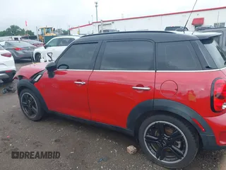 2015 MINI Countryman S with VIN WMWZC3C57FWT04338, listed as a IAAI auction lot 42524134 with 52,137 mi miles and . Bid and sale history available at DreamBid. Image 14.
