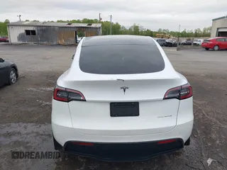 2024 Tesla Model Y Long Range with VIN 7SAYGAEE2RF014315, listed as a IAAI auction lot 42053183 with 36,521 mi miles and . Bid and sale history available at carsss.com. Image 16.