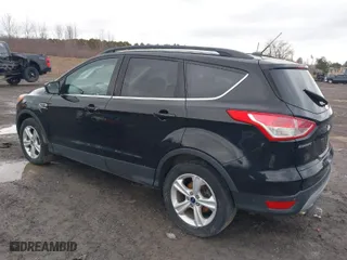 2016 Ford Escape SE with VIN 1FMCU9G97GUB49000, listed as a IAAI auction lot 41797005 with 104,690 mi miles. Bid and sale history available at carsss.com. Image 3.