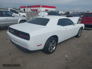 2017 Dodge Challenger SXT Plus with VIN 2C3CDZAG5HH658149, listed as a IAAI auction lot 41876762 with 128,126 mi miles. Bid and sale history available at carsss.com. Image 4.