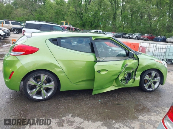 2012 Hyundai Veloster w/Gray Int with VIN KMHTC6AD6CU082432, listed as a IAAI auction lot 42121082 with 153,487 mi miles and . Bid and sale history available at DreamBid. Image 13.