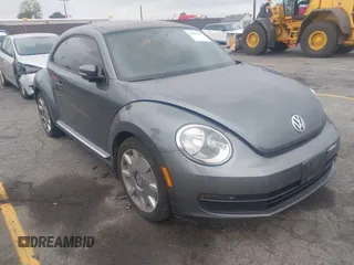 2013 Volkswagen Beetle 2.5L with VIN 3VWJP7AT6DM667477, listed as a IAAI auction lot 42215545 with 87,392 mi miles and . Bid and sale history available at DreamBid. Image 1.