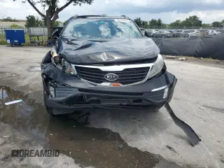 2012 Kia Sportage EX with VIN KNDPC3A21C7303209, listed as a Copart auction lot 58733605 with 189,587 mi miles and Salvage title. Bid and sale history available at DreamBid. Image 5.