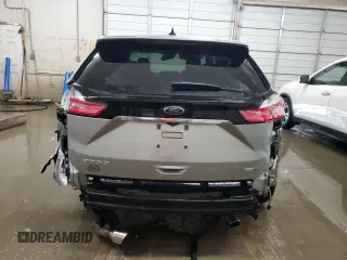 2020 Ford Edge SE z VIN 2FMPK4G9XLBA07766, wystawiony jako Copart lot #56852365 z przebiegiem 151 664 mil mil oraz Szkoda całkowita • Salvage title. Historia ofert i sprzedaży dostępna na DreamBid. Obrazek 6.