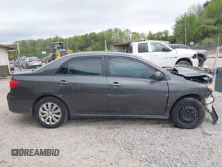 2012 Toyota Corolla L with VIN 2T1BU4EE3CC901530, listed as a IAAI auction lot 42099048 with 210,117 mi miles. Bid and sale history available at carsss.com. Image 14.