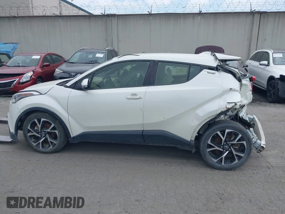 2019 Toyota C-HR XLE z VIN JTNKHMBX3K1029701, wystawiony jako IAAI lot #42023964 z przebiegiem 83 055 mil mil oraz . Historia ofert i sprzedaży dostępna na DreamBid. Obrazek 14.