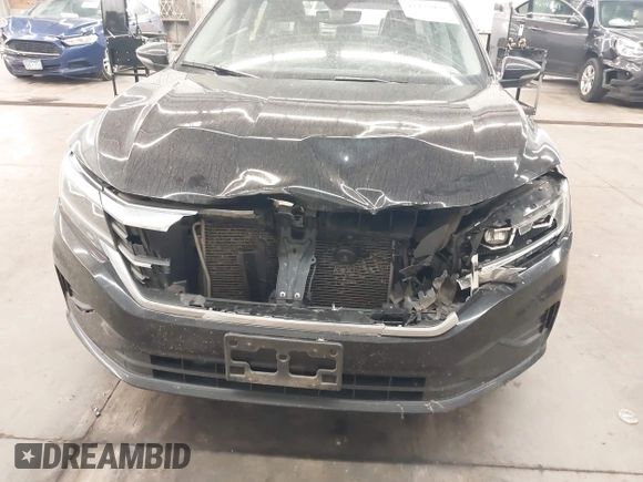 2020 Volkswagen Passat SE with VIN 1VWWA7A3XLC021477, listed as a IAAI auction lot 42473029 with 96,434 mi miles and . Bid and sale history available at DreamBid. Image 6.