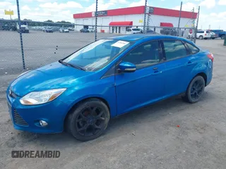 2013 Ford Focus SE z VIN 1FADP3F29DL300041, wystawiony jako IAAI lot #42361903 z przebiegiem 160 537 mil mil oraz . Historia ofert i sprzedaży dostępna na DreamBid. Obrazek 2.