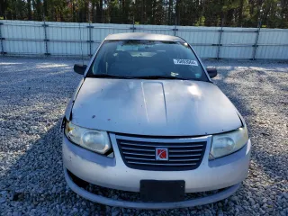 2005 Saturn ION ION 1 z VIN 1G8AG52F55Z160208, wystawiony jako Copart lot #70883064 z przebiegiem 237 716 mil mil oraz Nie do naprawy. Historia ofert i sprzedaży dostępna na DreamBid. Obrazek 5.
