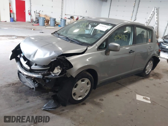 2009 Nissan Versa S with VIN 3N1BC13E59L498891, listed as a IAAI auction lot 42341967 with 156,007 mi miles and . Bid and sale history available at DreamBid. Image 17.