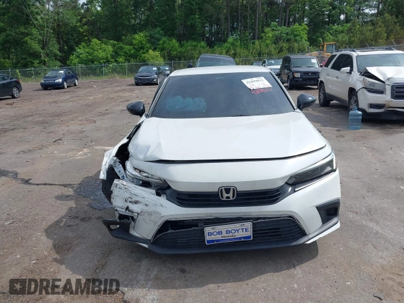 2023 Honda Civic Sport z VIN 2HGFE2F52PH551676, wystawiony jako IAAI lot #42099012 z przebiegiem 37 760 mil mil oraz . Historia ofert i sprzedaży dostępna na DreamBid. Obrazek 12.