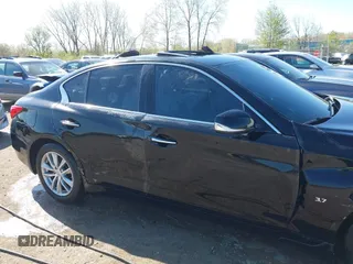2015 Infiniti Q50 Premium with VIN JN1BV7AR2FM396677, listed as a IAAI auction lot 42017514 with 98,967 mi miles. Bid and sale history available at carsss.com. Image 12.