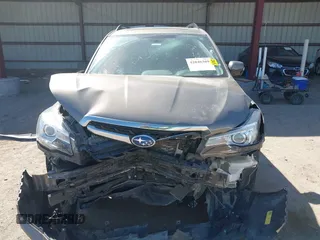2017 Subaru Forester Touring z VIN JF2SJAWC8HH582683, wystawiony jako IAAI lot #42046369 z przebiegiem 71 070 mil mil oraz . Historia ofert i sprzedaży dostępna na DreamBid. Obrazek 11.