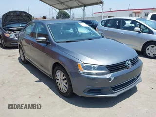 2014 Volkswagen Jetta SE with VIN 3VWD17AJ0EM247826, listed as a IAAI auction lot 42574880 with 121,697 mi miles and . Bid and sale history available at DreamBid. Image 1.