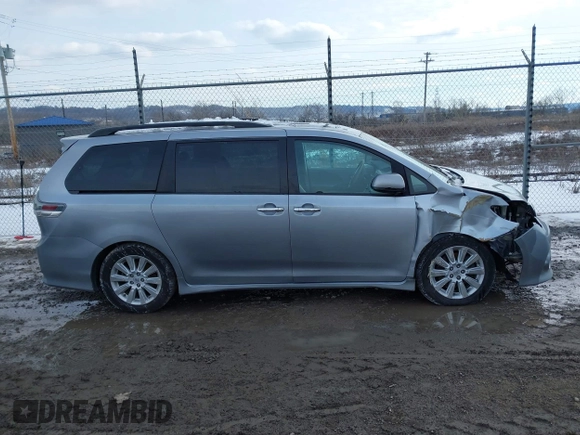 2013 Toyota Sienna SE with VIN 5TDXK3DC0DS354540, listed as a IAAI auction lot 41445501 with 238,814 mi miles and . Bid and sale history available at DreamBid. Image 13.