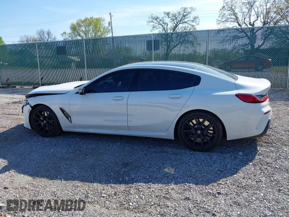 2022 BMW 8 Series M850i with VIN WBAGV8C09NCH15245, listed as a IAAI auction lot 42053154 with 26,384 mi miles and . Bid and sale history available at DreamBid. Image 14.