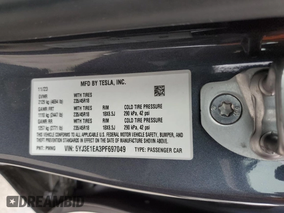 2023 Tesla Model 3 with VIN 5YJ3E1EA3PF697049, listed as a Copart auction lot 55601295 with 12,373 mi miles and Salvage Title. Bid and sale history available at DreamBid. Image 12.