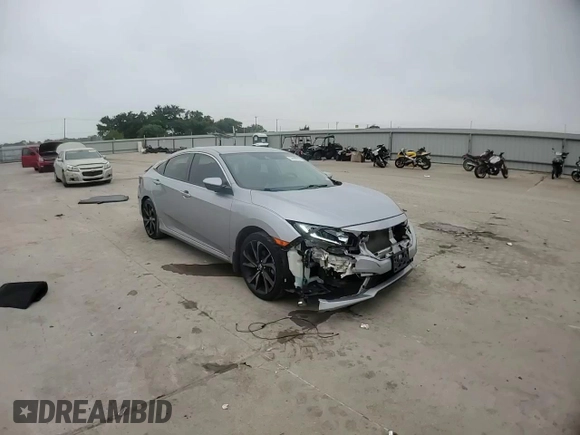 2019 Honda Civic Sport with VIN 19XFC2F80KE031091, listed as a Copart auction lot 54488535 with 68,106 mi miles and Salvage title. Bid and sale history available at DreamBid. Image 13.