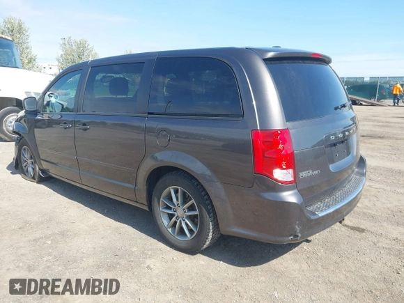 2015 Dodge Grand Caravan SE with VIN 2C4RDGBG2FR684367, listed as a IAAI auction lot 42167621 with 216,628 mi miles and . Bid and sale history available at DreamBid. Image 3.