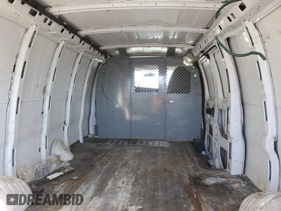 2014 Chevrolet Express Cargo Van with VIN 1GCWGGFA9E1105801, listed as a Copart auction lot 45789185 with 117,119 mi miles and Salvage Title. Bid and sale history available at carsss.com. Image 10.