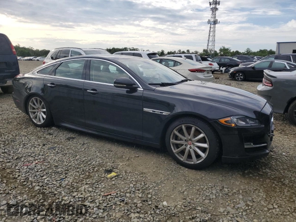 2019 Jaguar XJ R-Sport with VIN SAJWJ1CD1K8W18574, listed as a Copart auction lot 65041445 with 101,072 mi miles and Clean title. Bid and sale history available at DreamBid. Image 4.