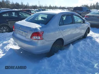 2009 Toyota Yaris with VIN JTDBT903191334821, listed as a IAAI auction lot 41598934 with 235,248 mi miles. Bid and sale history available at carsss.com. Image 4.