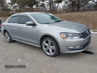 2014 Volkswagen Passat TDI SEL Premium with VIN 1VWCN7A33EC019984, listed as a IAAI auction lot 41412151 with 153,483 mi miles. Bid and sale history available at carsss.com. Image 1.