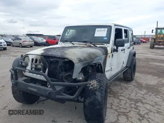 2012 Jeep Wrangler Unlimited Call of Duty MW3 with VIN 1C4BJWFG2CL279645, listed as a IAAI auction lot 41913375 with 1 mi miles. Bid and sale history available at carsss.com. Image 2.