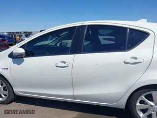 2015 Toyota Prius c One with VIN JTDKDTB37F1089798, listed as a IAAI auction lot 41838827 with 137,655 mi miles. Bid and sale history available at carsss.com. Image 14.