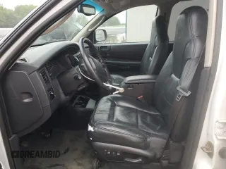 2001 Dodge Durango z VIN 1B4HS28Z21F570427, wystawiony jako Copart lot #58657475 z przebiegiem 114 295 mil mil oraz Tytuł czysty. Historia ofert i sprzedaży dostępna na DreamBid. Obrazek 7.