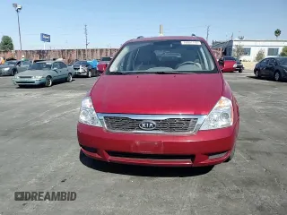 2011 Kia Sedona LX with VIN KNDMG4C75B6410550, listed as a Copart auction lot 76997744 with 74,659 mi miles and Salvage Title. Bid and sale history available at carsss.com. Image 12.
