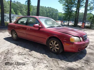 2004 Kia Optima LX z VIN KNAGD128045285896, wystawiony jako IAAI lot #42518275 z przebiegiem 150 060 mil mil oraz . Historia ofert i sprzedaży dostępna na DreamBid. Obrazek 1.
