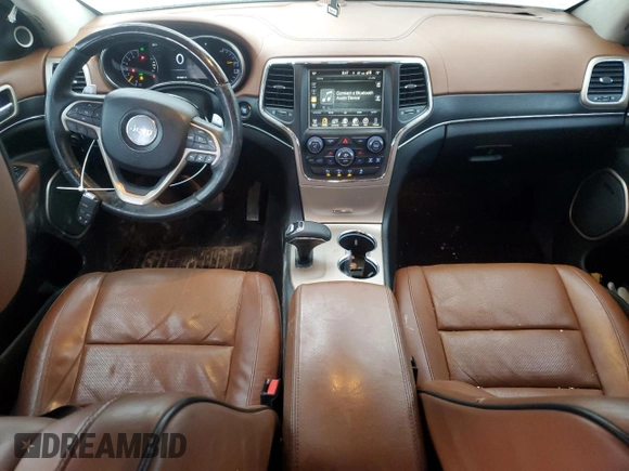 2015 Jeep Grand Cherokee Summit with VIN 1C4RJFJG2FC150752, listed as a Copart auction lot 45031365 with 151,682 mi miles and Salvage Title. Bid and sale history available at DreamBid. Image 8.