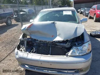 2004 Toyota Avalon XL with VIN 4T1BF28B34U376467, listed as a IAAI auction lot 41883436 with 183,114 mi miles. Bid and sale history available at carsss.com. Image 11.