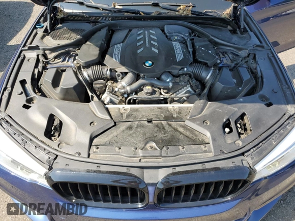 2020 BMW 5 Series M550i xDrive with VIN WBAJS7C0XLBN96338, listed as a Copart auction lot 60591815 with 73,910 mi miles and Salvage title. Bid and sale history available at DreamBid. Image 11.