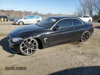 2015 BMW 4 Series 428i with VIN WBA3V7C56FP772739, listed as a Copart auction lot 82468624 with 50,320 mi miles and Salvage Title. Bid and sale history available at carsss.com. Image 1.