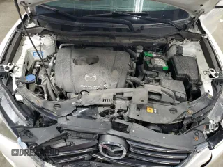 2016 Mazda CX-5 Sport with VIN JM3KE4BY9G0694709, listed as a Copart auction lot 55147555 with 98,900 mi miles and Salvage title. Bid and sale history available at DreamBid. Image 12.