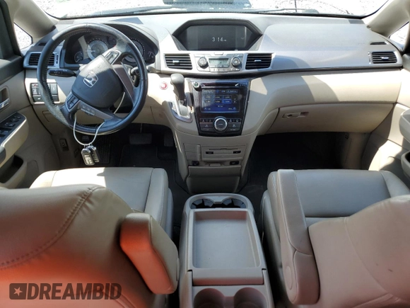 2014 Honda Odyssey EX-L with VIN 5FNRL5H63EB101062, listed as a Copart auction lot 56656825 with 183,871 mi miles and Salvage title. Bid and sale history available at DreamBid. Image 8.
