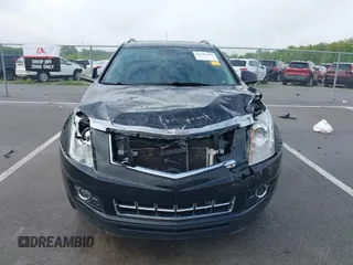 2015 Cadillac SRX Performance Collection with VIN 3GYFNCE3XFS638994, listed as a IAAI auction lot 42243558 with 141,704 mi miles and . Bid and sale history available at DreamBid. Image 12.