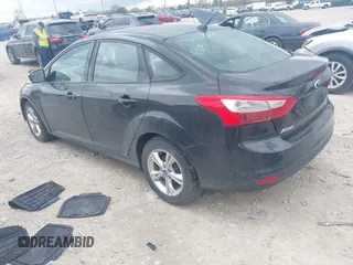 2013 Ford Focus SE with VIN 1FADP3F25DL209199, listed as a IAAI auction lot 42086573 with 136,999 mi miles. Bid and sale history available at carsss.com. Image 3.