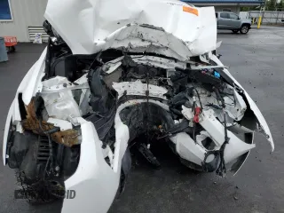 2020 Toyota Tacoma SR5 z VIN 3TMCZ5AN2LM339564, wystawiony jako Copart lot #57871255 z przebiegiem Nie podano mil oraz Szkoda całkowita • Salvage title. Historia ofert i sprzedaży dostępna na DreamBid. Obrazek 11.